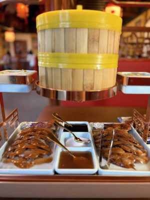 Chef arranging dishes